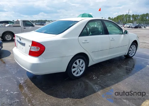 2003 Toyota Camry Xle z USA, uszkodzony, nr VIN 4T1BE30K03U192283